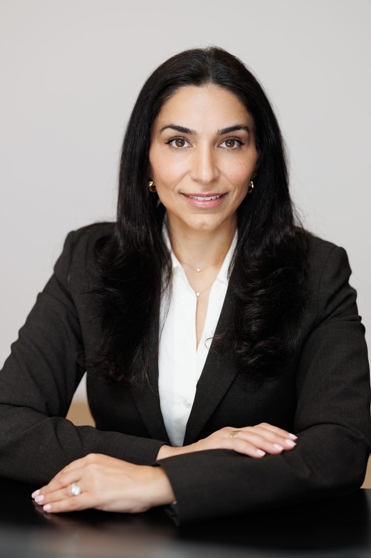 The same corporate headshot after professional retouching