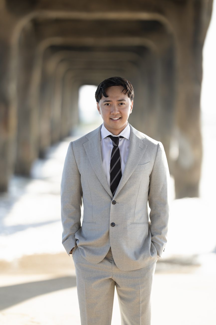 Full-length on-location portrait of an agency founder